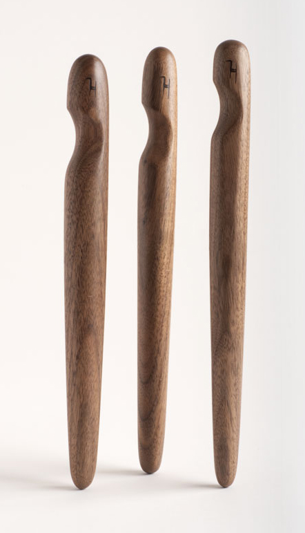 Spirtles in walnut with thumb groove.